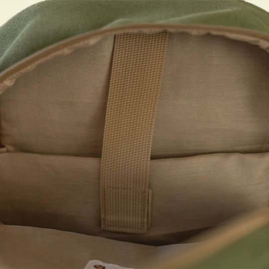 Sage green kids laptop backpack from Pachee, featuring a secure laptop compartment with quality velcro straps.