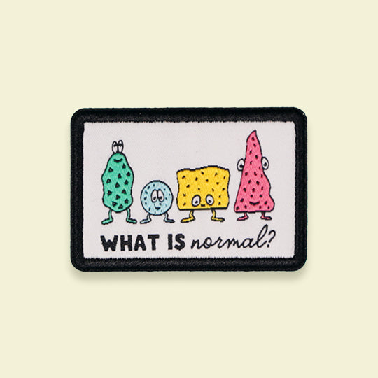 A product image featuring a What is normal patch with funny faces, adding a playful touch to your everyday essentials.