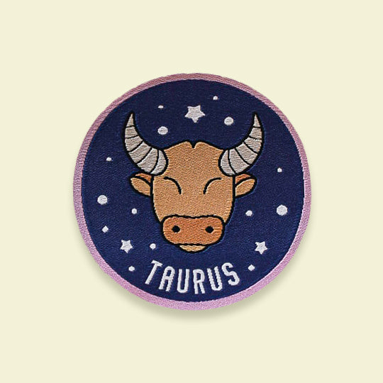 Colourful Taurus Zodiac iron-on patch with symbol and name available from Pachee UK.