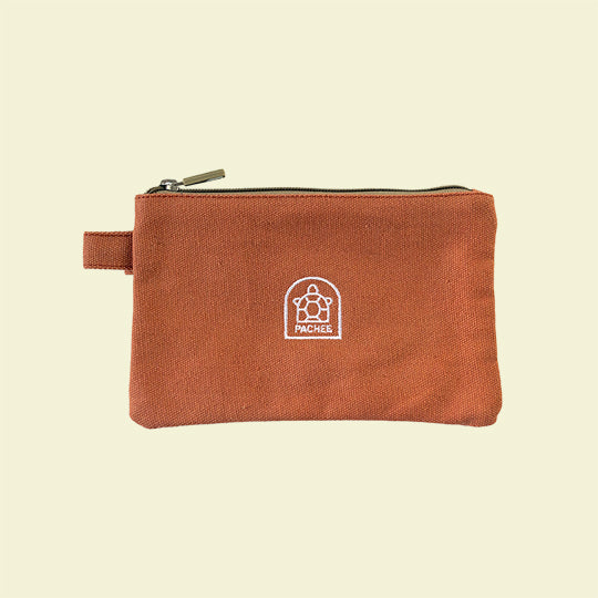 Canvas orange pouches featuring the Pachee logo, displayed prominently for sale on the Pachee online store in the UK.