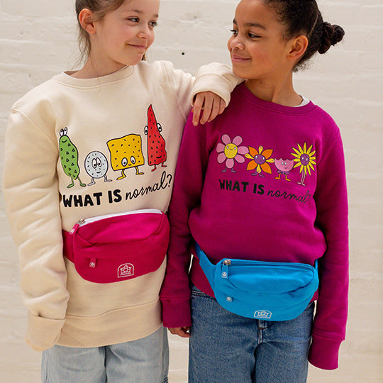 Two young girls showcasing stylish bum bags—one with a blue bum bag and the other with a pink bum bag, perfect for a trendy look.