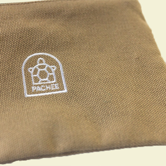 Neutral-coloured canvas pouches made from quality materials, available at Pachee's online store in the UK.
