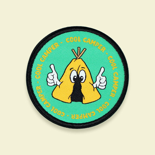 Cool Camper Patch featuring a vibrant design of a camp with colourful details and bold lettering.