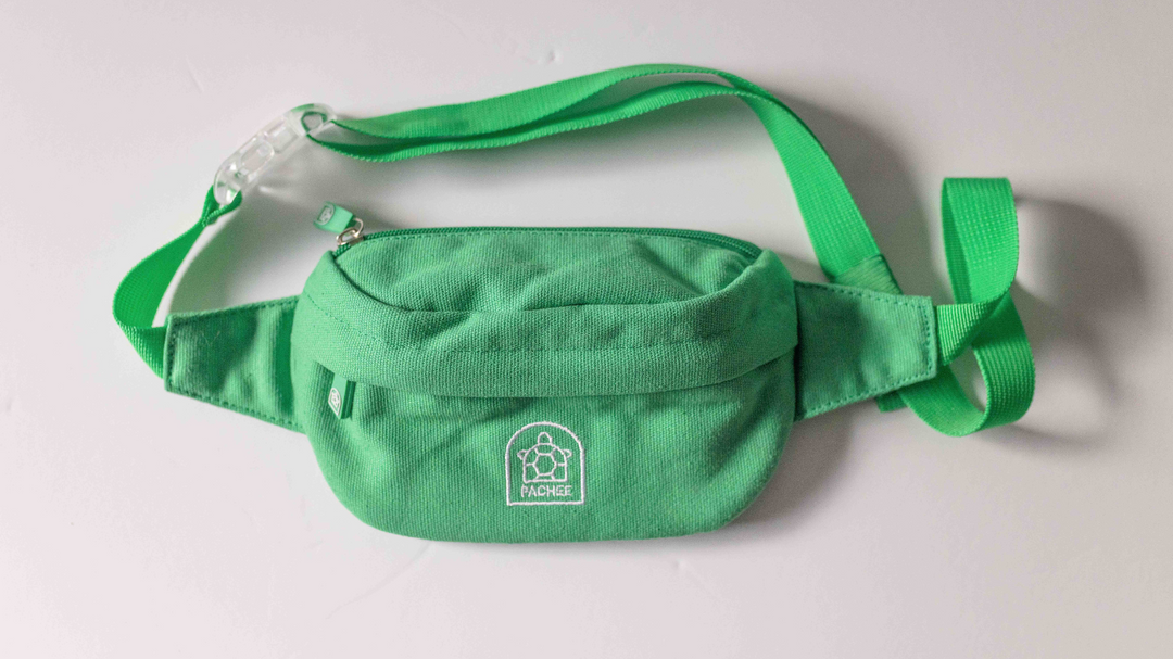 Full view of a green bum bag with adjustable straps, displayed on a clean background. Available at Pachee online store.