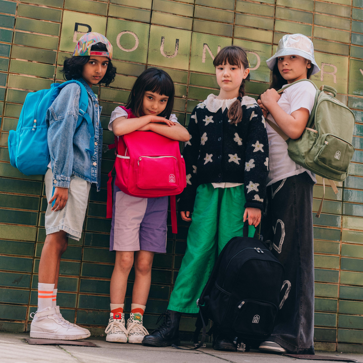 Stylish kids wearing colorful quality backpacks from Pachee, showcasing vibrant designs and trendy styles for school.