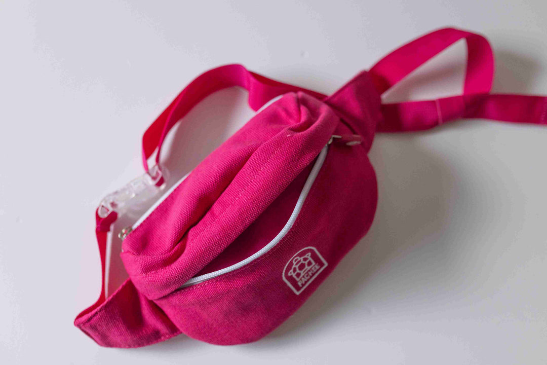 Pink kids' bum bag with a stylish crossbody design, featuring adjustable straps and quality materials. Shop at Pachee.