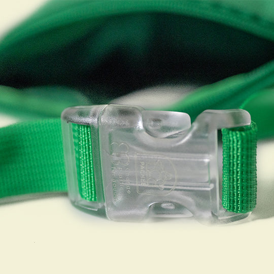 Quality green bum bag with a transparent buckle for the waist strap, combining style, durability, and functionality.