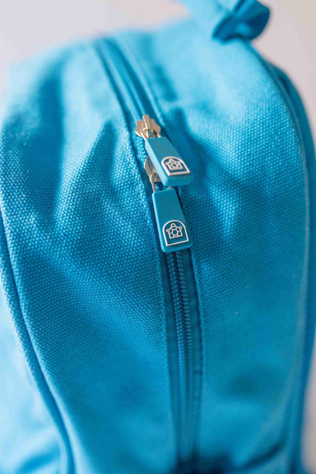 Closed Quality Junior Backpack featuring two zippers, showcasing a stylish design, available at Pachee online store.