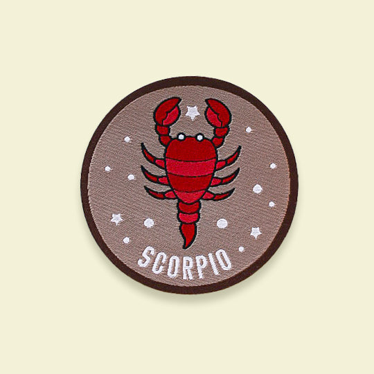 Scorpio patch featuring a vibrant scorpion symbol with the text 'Scorpio,' available as iron-on or sew-on for personalization.