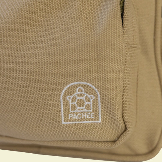 Pachee's Mini Backpacks in neutral color featuring the Pachee logo, available at the online store.