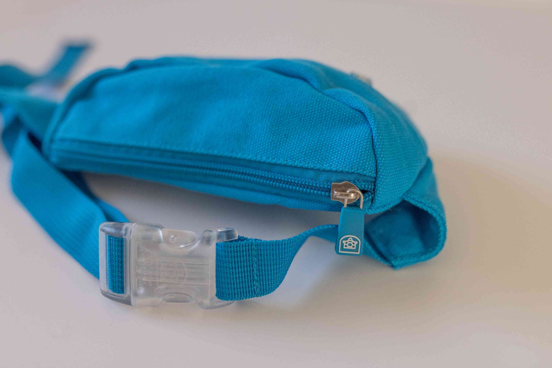 Kids Bum Bag with a zippered main compartment and an adjustable waist strap.