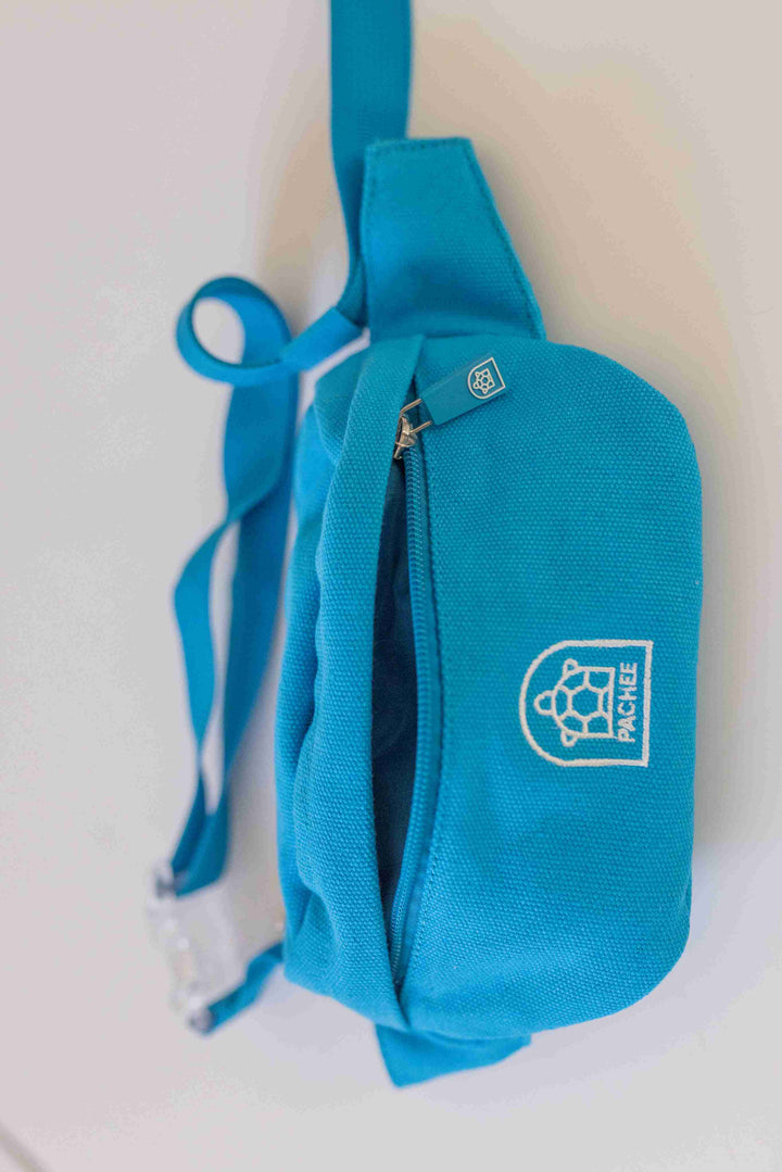 Waterproof blue bum bag displayed for sale at Pachee online store, showcasing its stylish design and functionality.